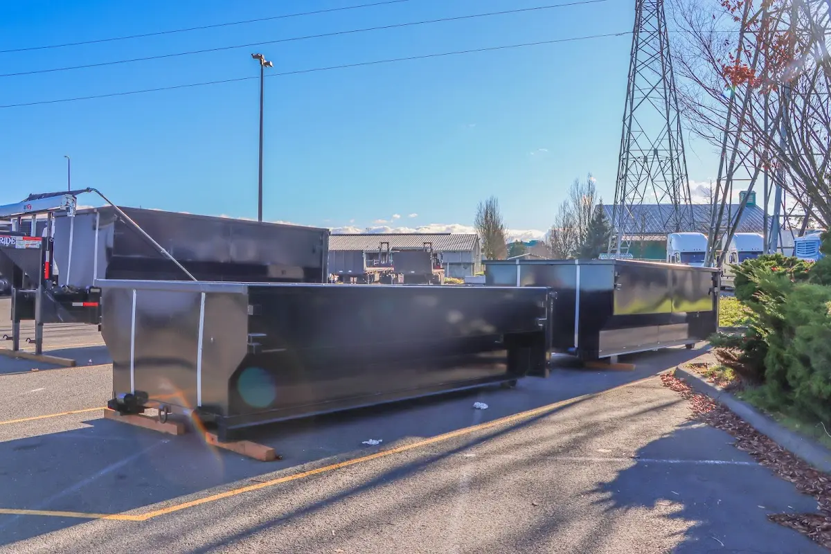 Roll-off dumpster ready for waste disposal at job site for Demolition Dumpster Rental in Lakeland